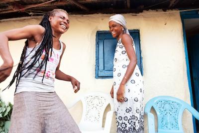 Mariama Kamara (left), now a PIH Sierra Leone employee, was at an Ebola treatment center for almost five weeks, without any form of communication with her daughter, Hawa (right). 