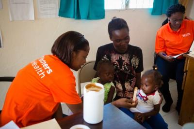 Child in Haiti eating Nourimanba