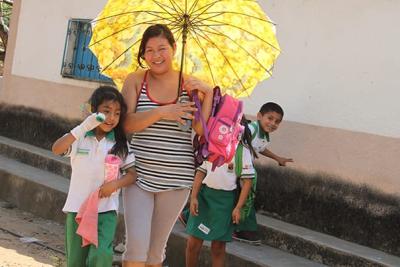 Velasquez picks up her daughter from school in Chiapas, Mexico.