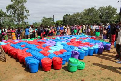 People lining up for food distribution in Malawi