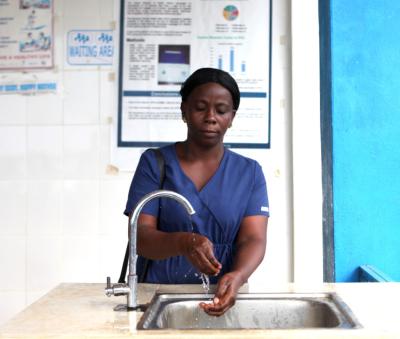 Midwife washing her hands