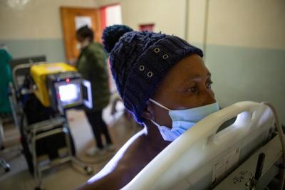 Mabuoang Sefole is screened for tuberculosis.