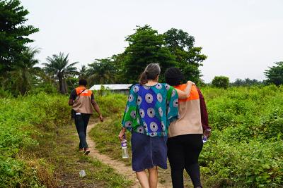 Dr. Joia Mukherjee, PIH senior clinical and academic advisor, left, leans on Dr. Sarah A. Morris, deputy director for clinical services in Liberia.