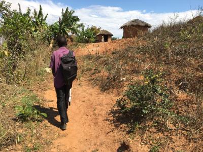 Senior CHW visiting a family in Malawi