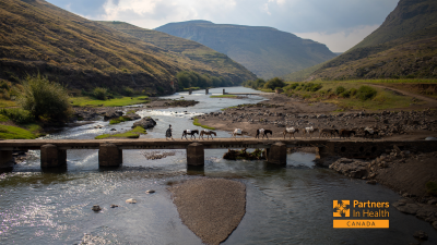 A one-lane bridge connects the mountainous terrain in Lesotho, where PIH provides lifesaving care.