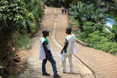 Two vaccination team members take a break after a long morning.