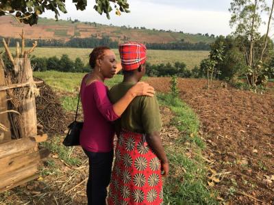 Dr. Akiiki Florence Bitalabeho speaks with patient in Rwanda.