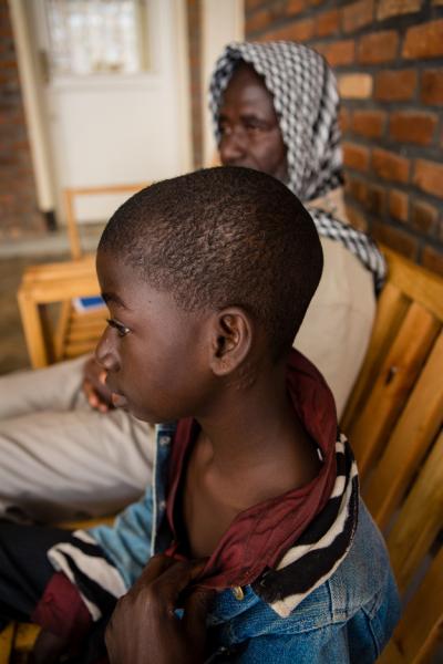 Young boy with father at Butaro District Hospital in northern Rwanda.