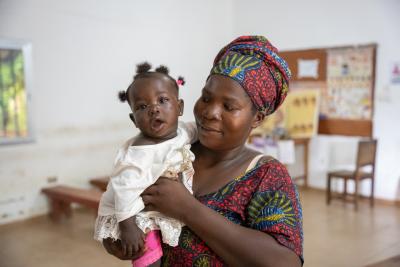 Susan Kamara is holding her 6-month-year old girl Salimatu.