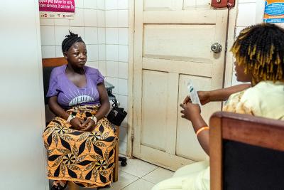 Sia hears about family planning and reproductive health from Nurse Patience.