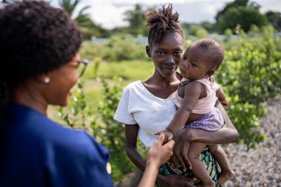 Fatimata Foday with her six-month old baby girl Bintu