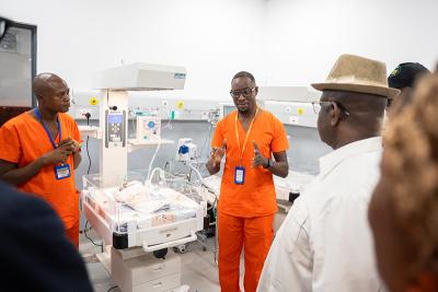 Maternal Center of Excellence ribbon-cutting and inauguration event with medical professionals and participants at the NICU