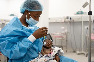 Phebian Baningo feeds her daughter, Grace, by nasogastric tube in the NICU at the MCOE on Feb. 17, 2026.