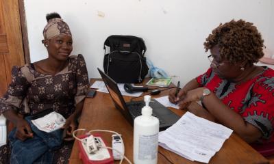 Doctor talks with mother