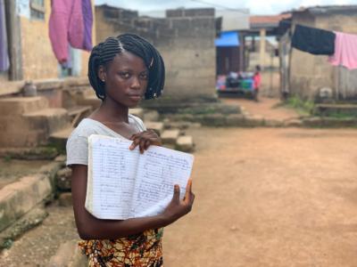 Young girl holding a book