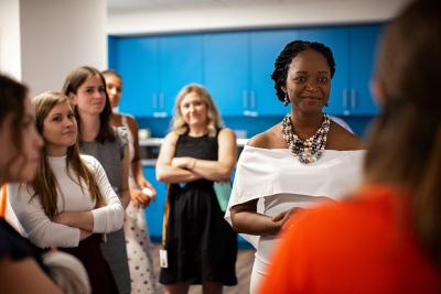 Graciela Cadet talking to colleagues