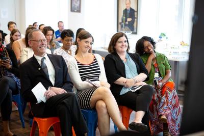 Family and colleagues congratulating grads in Haiti