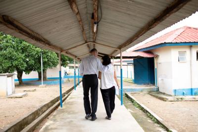Paul and friend walk in Sierra Leone
