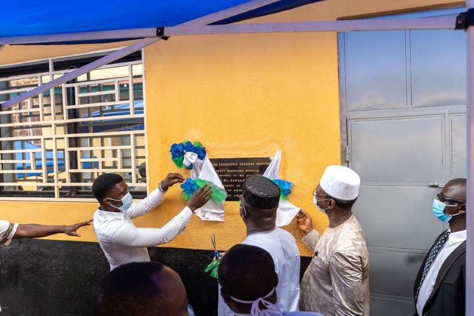 Staff and government officials celebrate the renovations at the Sierra Leone Psychiatric Teaching Hospital